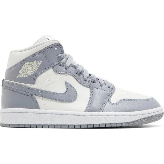 Jordan 1 Mid Stealth (W) by Jordan's in Shoes. Available at KershKicks for £135.00. A must-have for fans of Jordan's looking to elevate their style with this Shoes.