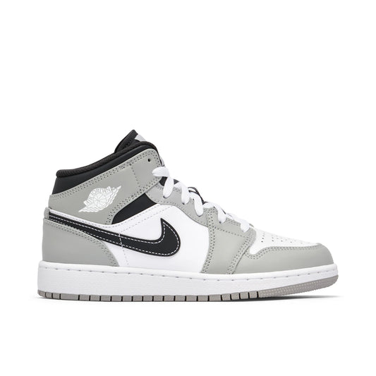 Jordan 1 Mid Light Smoke Grey Anthracite (GS) by Jordan's in Shoes. Available at KershKicks for £195.00. A must-have for fans of Jordan's looking to elevate their style with this Shoes.