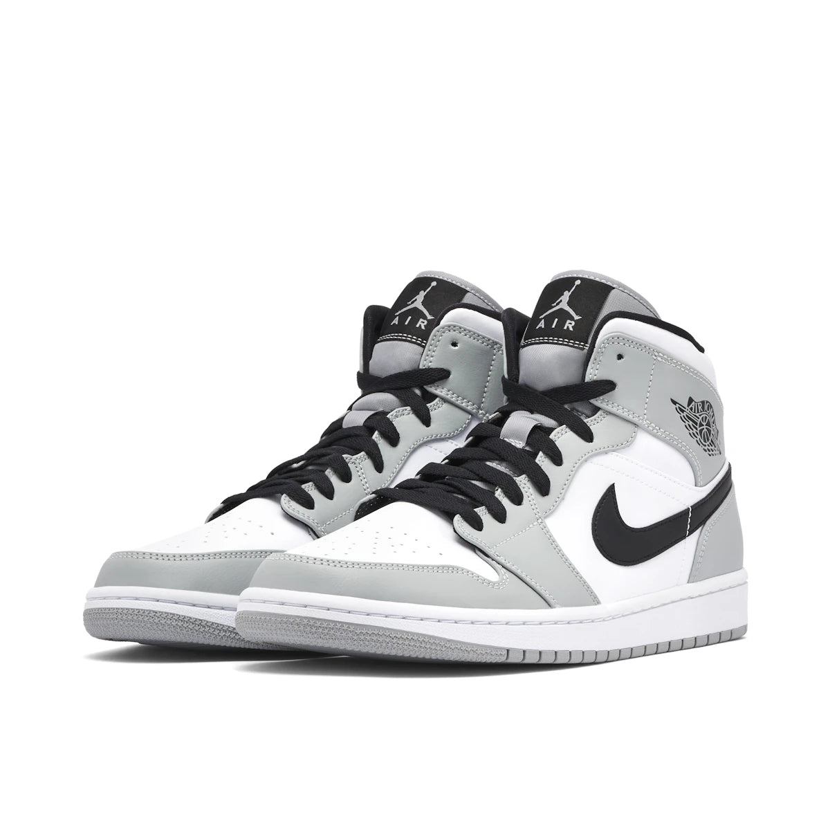 Jordan 1 Mid Light Smoke Grey by Jordan's in Shoes. Available at KershKicks for £235.00. A must-have for fans of Jordan's looking to elevate their style with this Shoes.