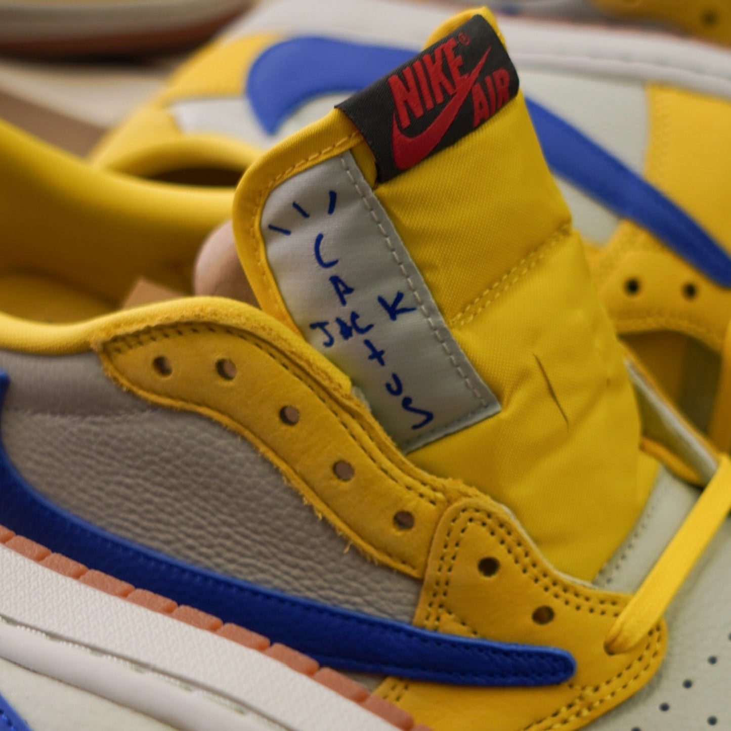 Jordan 1 Retro Low OG SP Travis Scott Canary (Women's) by Jordan's in Shoes. Available at KershKicks for £400.00. A must-have for fans of Jordan's looking to elevate their style with this Shoes.