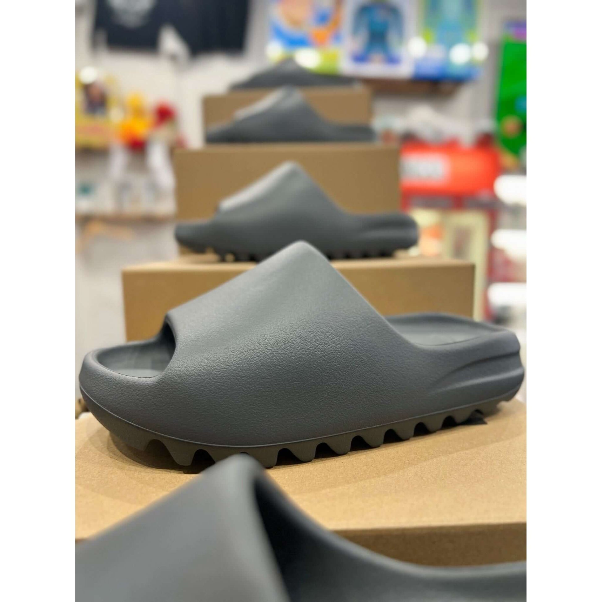 adidas Yeezy Slide Slate Grey by Yeezy in Shoes. Available at KershKicks for £100.00. A must-have for fans of Yeezy looking to elevate their style with this Shoes.