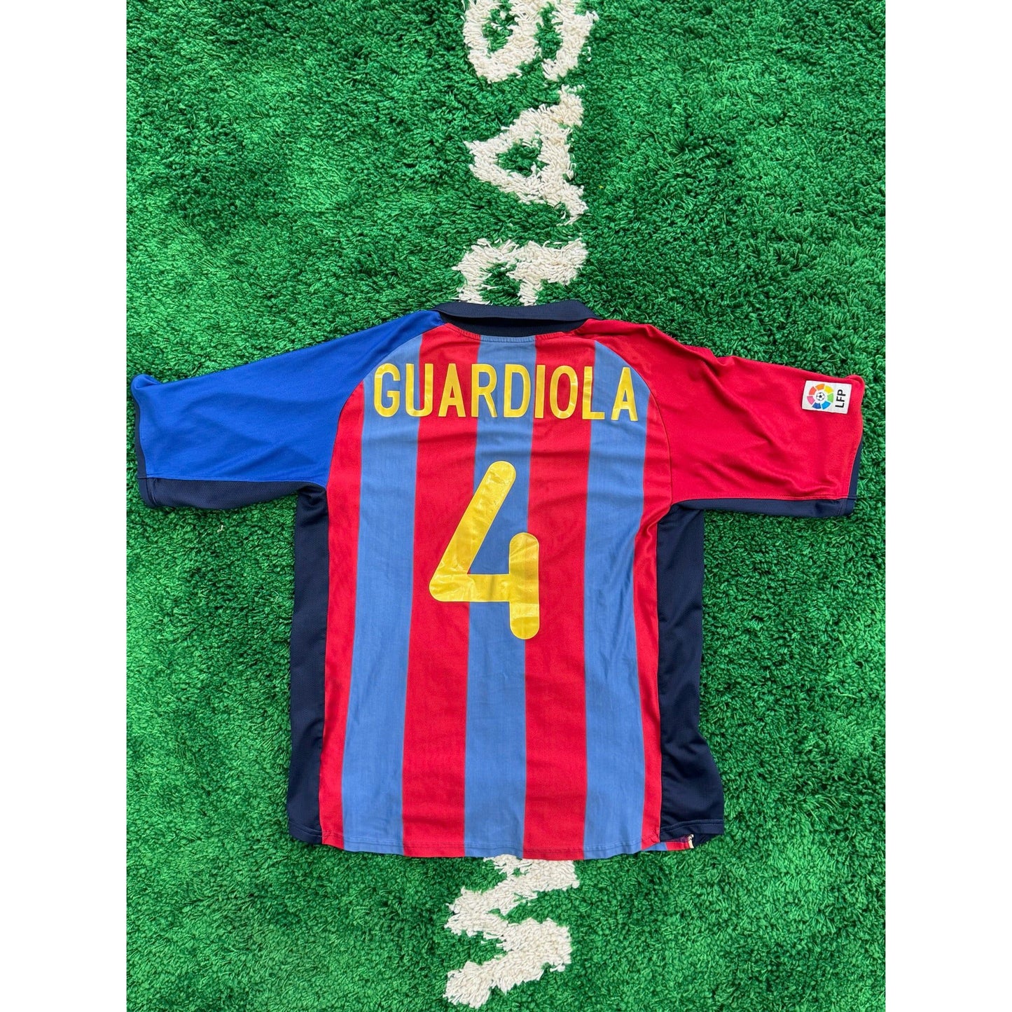 Barcelona Home Shirt 2001-2002 Guardiola #4 XL by KershKits in Clothing. Available at KershKicks for £95.00. A must-have for fans of KershKits looking to elevate their style with this Kits.