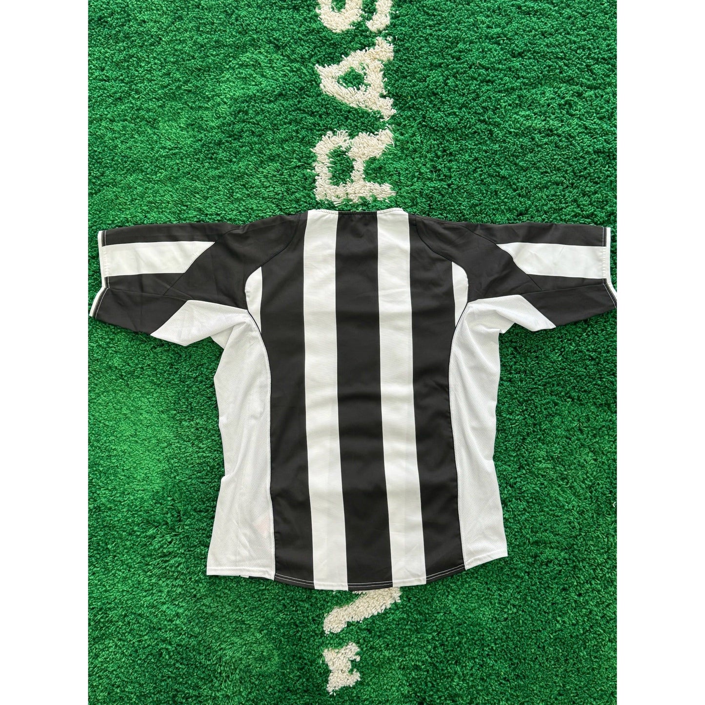 Juventus Home Shirt 2004-2005 XL by KershKits in Clothing. Available at KershKicks for £75.00. A must-have for fans of KershKits looking to elevate their style with this Kits.