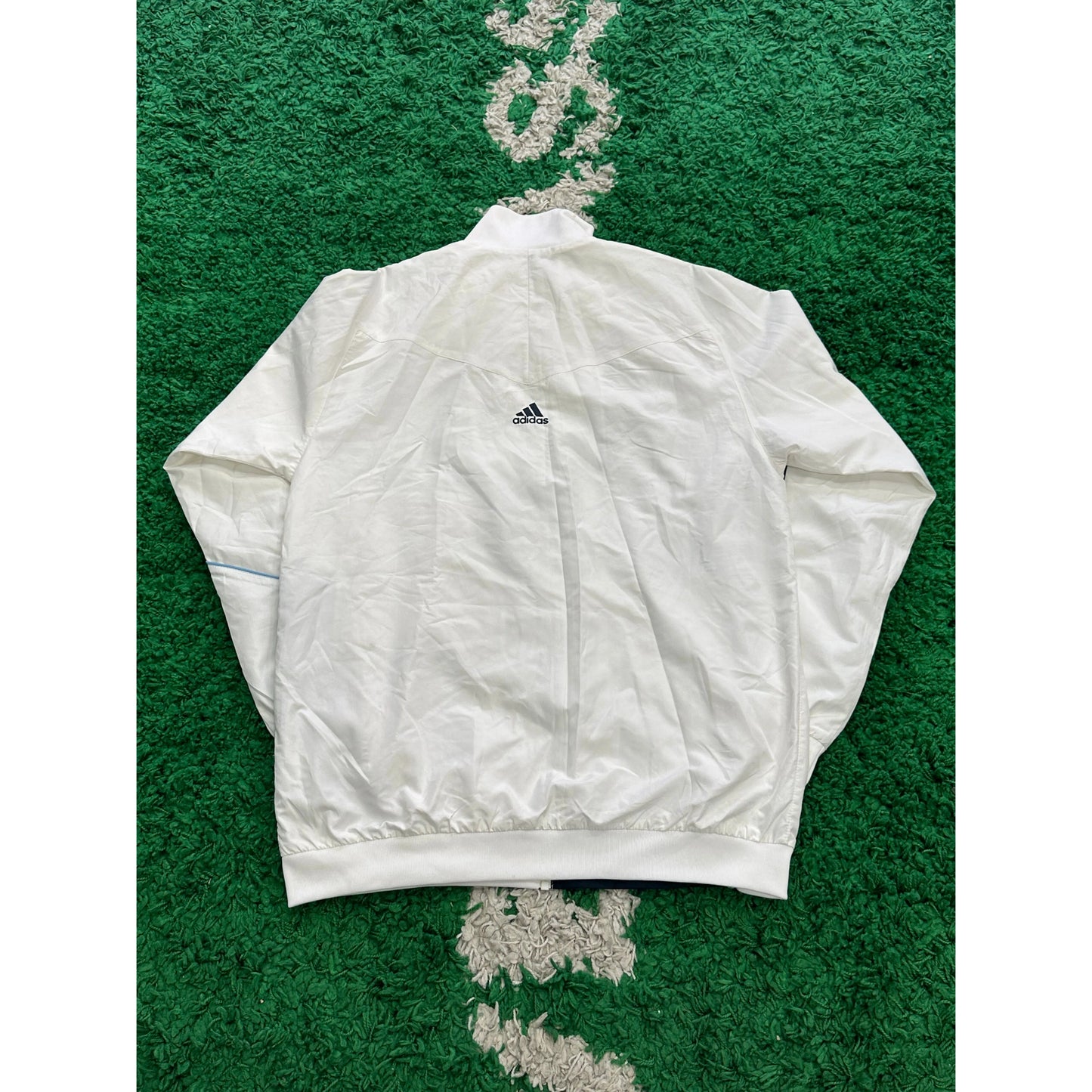 Adidas Real Madrid UCL Track Jacket 2009 L by KershKits in Uncategorized. Available at KershKicks for £65.00. A must-have for fans of KershKits looking to elevate their style with this Kits.