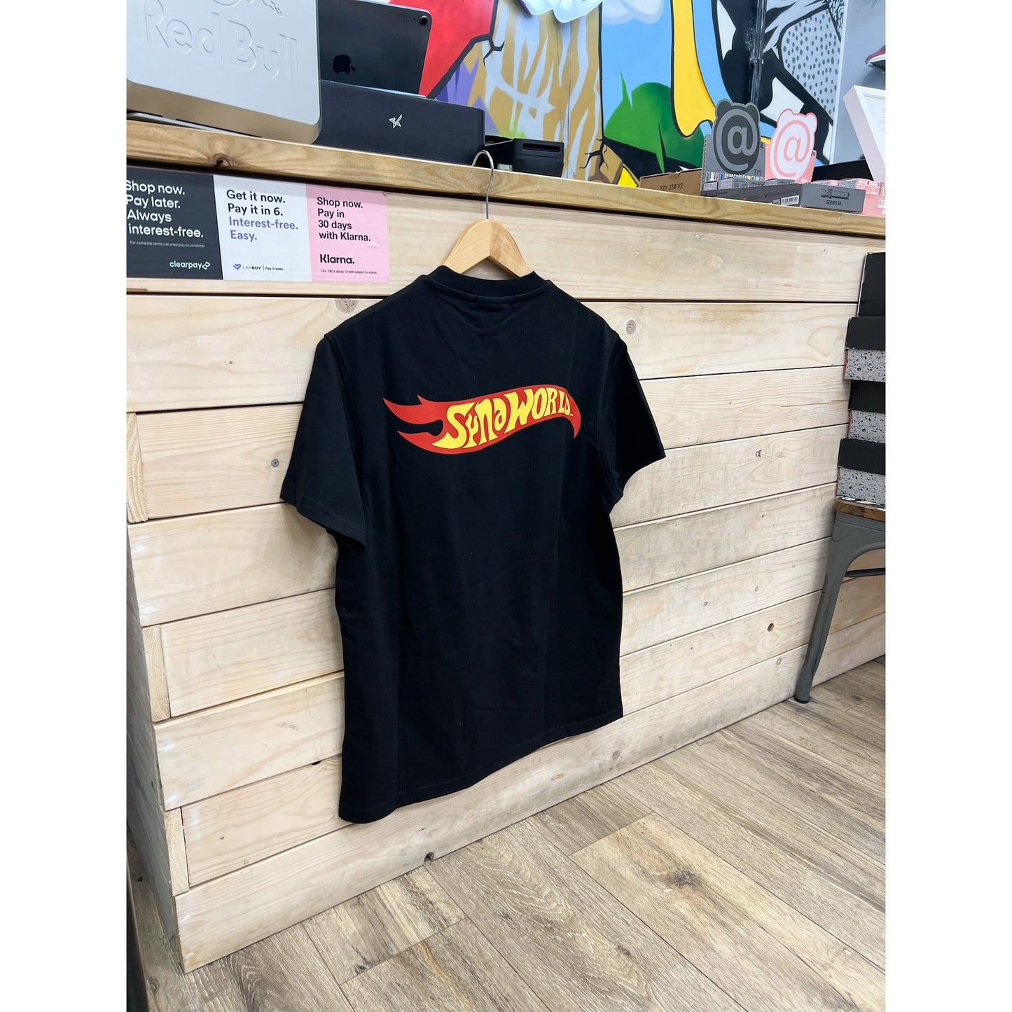 Syna World Hot Wheels T-Shirt Black by SYNA in Uncategorized. Available at KershKicks for £60.00. A must-have for fans of SYNA looking to elevate their style with this T-Shirt.