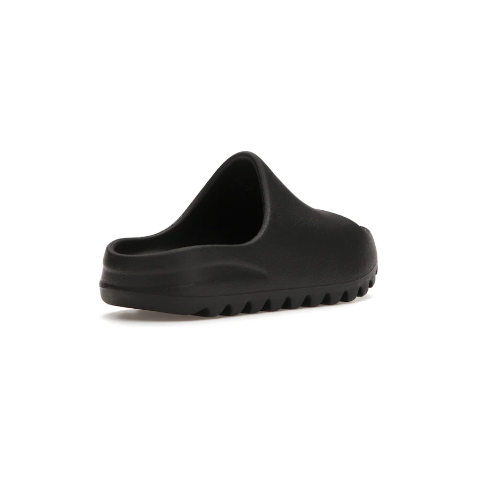 Yeezy Slide Onyx (Kids) by Adidas in Shoes. Available at KershKicks for £70.00. A must-have for fans of Adidas looking to elevate their style with this Kids Trainers.