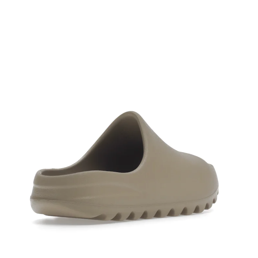 Yeezy Slide Pure (Kids) by Adidas in Shoes. Available at KershKicks for £90.00. A must-have for fans of Adidas looking to elevate their style with this Kids Trainers.