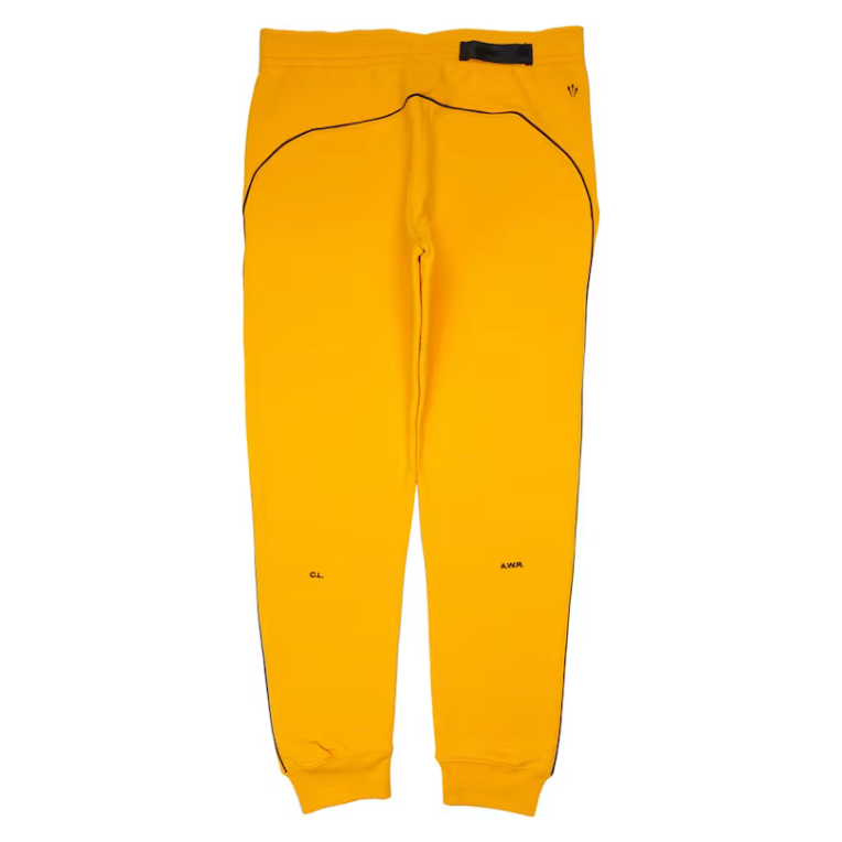Nike x Drake NOCTA Fleece Pants Yellow by Nike in Uncategorized. Available at KershKicks for £100.00. A must-have for fans of Nike looking to elevate their style with this Sweatpants.