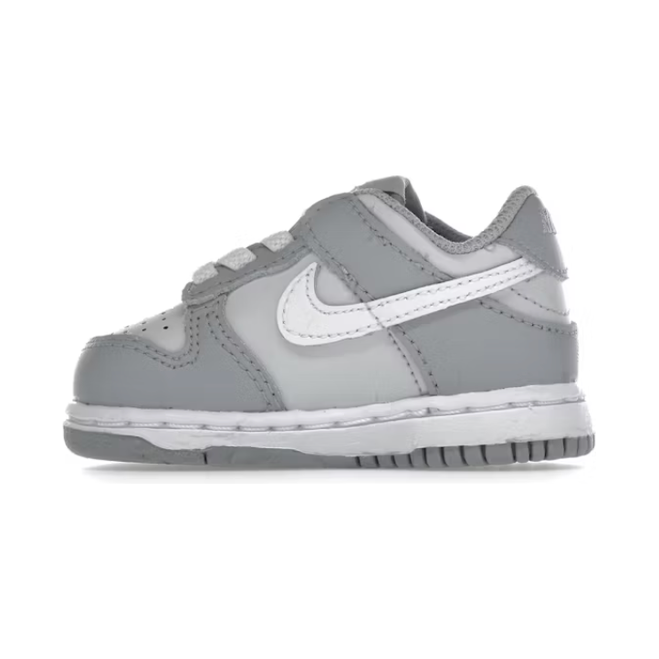 Nike Dunk Low Two-Toned Grey (TD) by Nike in Shoes. Available at KershKicks for £60.00. A must-have for fans of Nike looking to elevate their style with this Kids Trainers.