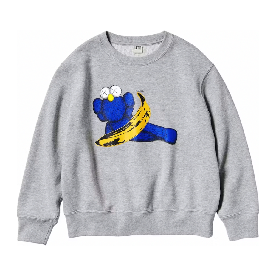 KAWS x Uniqlo Warhol Graphic Banana Sweatshirt Grey by Kaws in Uncategorized. Available at KershKicks for £45.00. A must-have for fans of Kaws looking to elevate their style with this Crewneck.