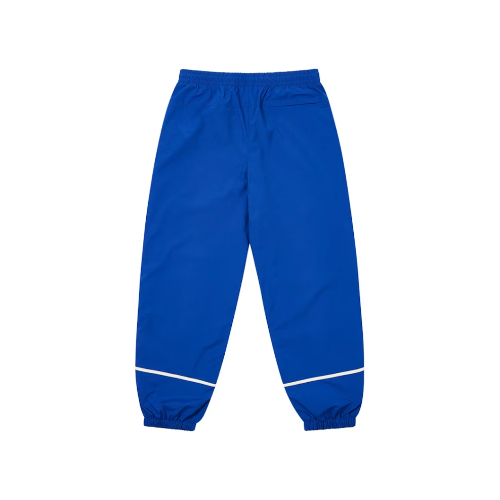 Palace Pro Team 02 Shell Jogger Blue Berry by Palace in Uncategorized. Available at KershKicks for £200.00. A must-have for fans of Palace looking to elevate their style with this Sweatpants.