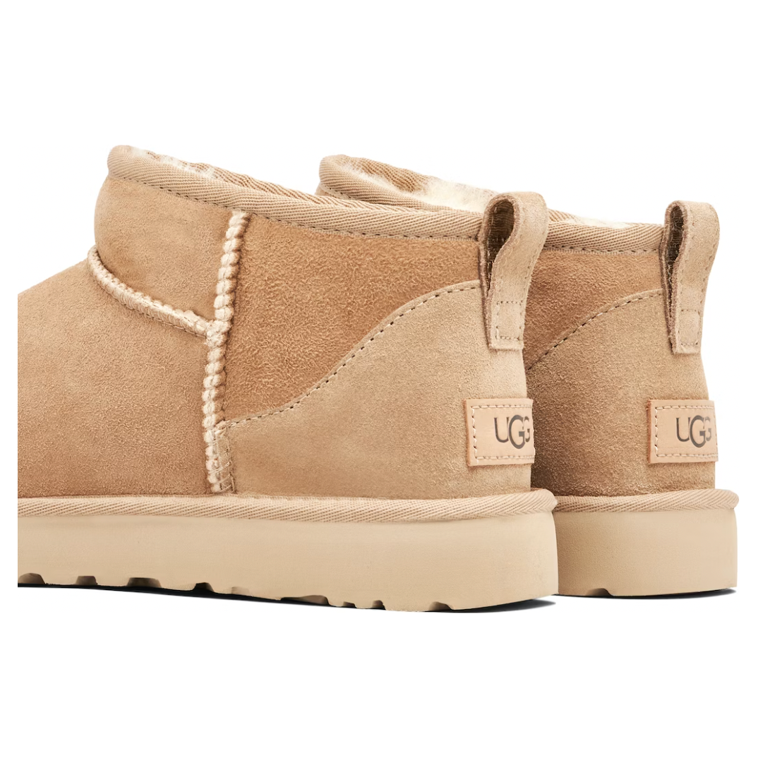 UGG Classic Ultra Mini Boot Sand (Women's) by UGG in Shoes. Available at KershKicks for £215.00. A must-have for fans of UGG looking to elevate their style with this Shoes.