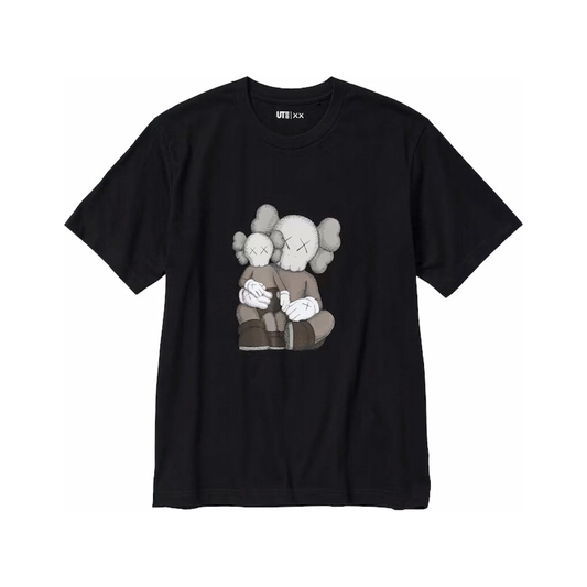 KAWS UT GRAPHIC T-SHIRT BLACK by Kaws in Clothing. Available at KershKicks for £42.00. A must-have for fans of Kaws looking to elevate their style with this T-Shirt.