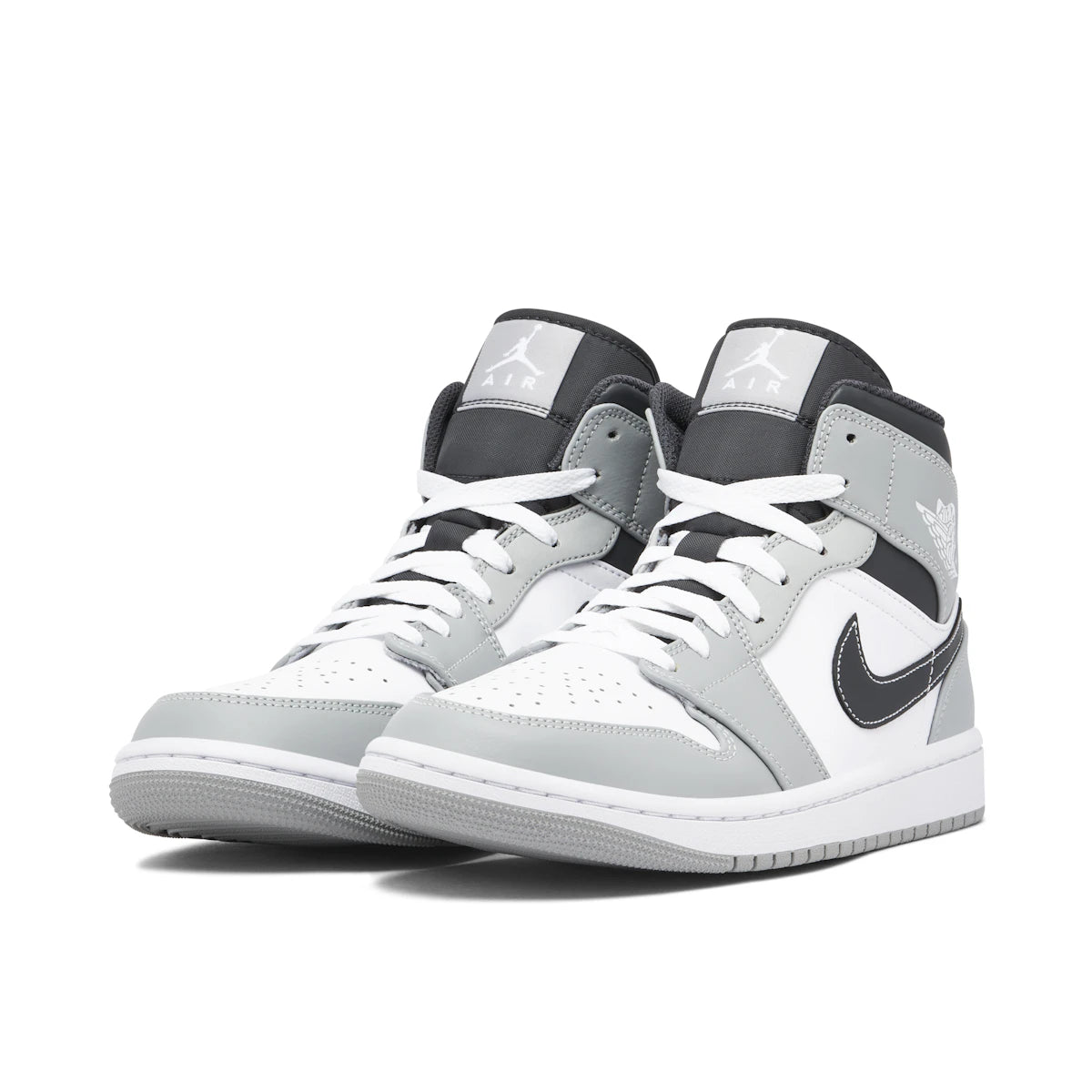 Jordan 1 Mid Light Smoke Grey Anthracite by Jordan's in Shoes. Available at KershKicks for £185.00. A must-have for fans of Jordan's looking to elevate their style with this Shoes.