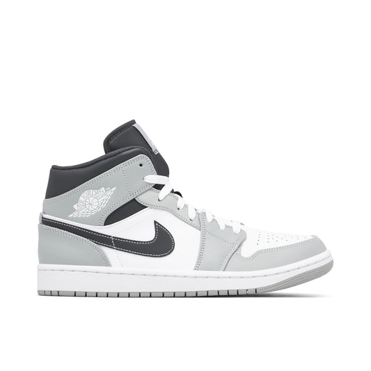 Jordan 1 Mid Light Smoke Grey Anthracite by Jordan's in Shoes. Available at KershKicks for £185.00. A must-have for fans of Jordan's looking to elevate their style with this Shoes.