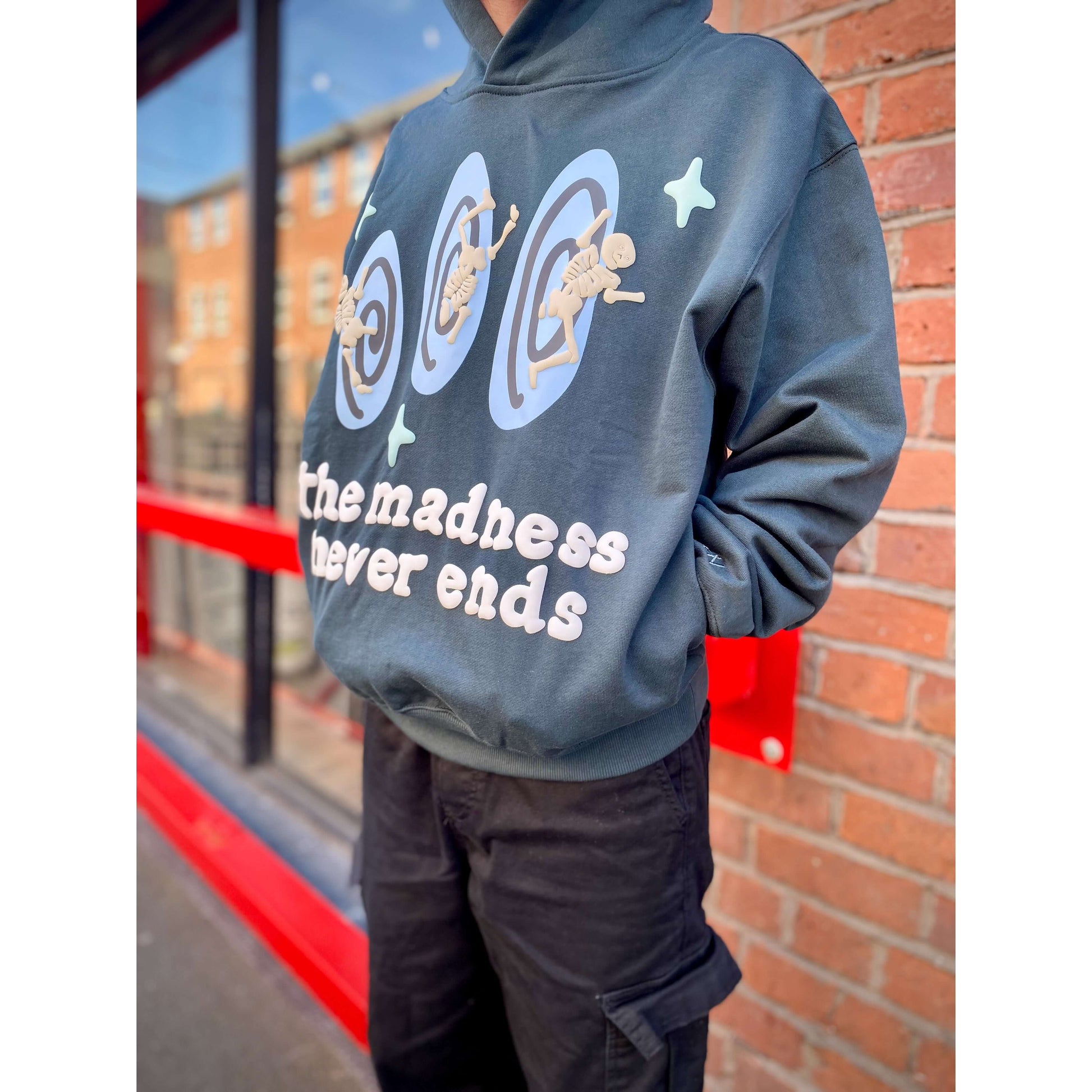 Broken Planet Market Madness Never Ends Hoodie - Sapphire by Broken Planet Market in Clothing. Available at KershKicks for £195.00. A must-have for fans of Broken Planet Market looking to elevate their style with this Hoodie.
