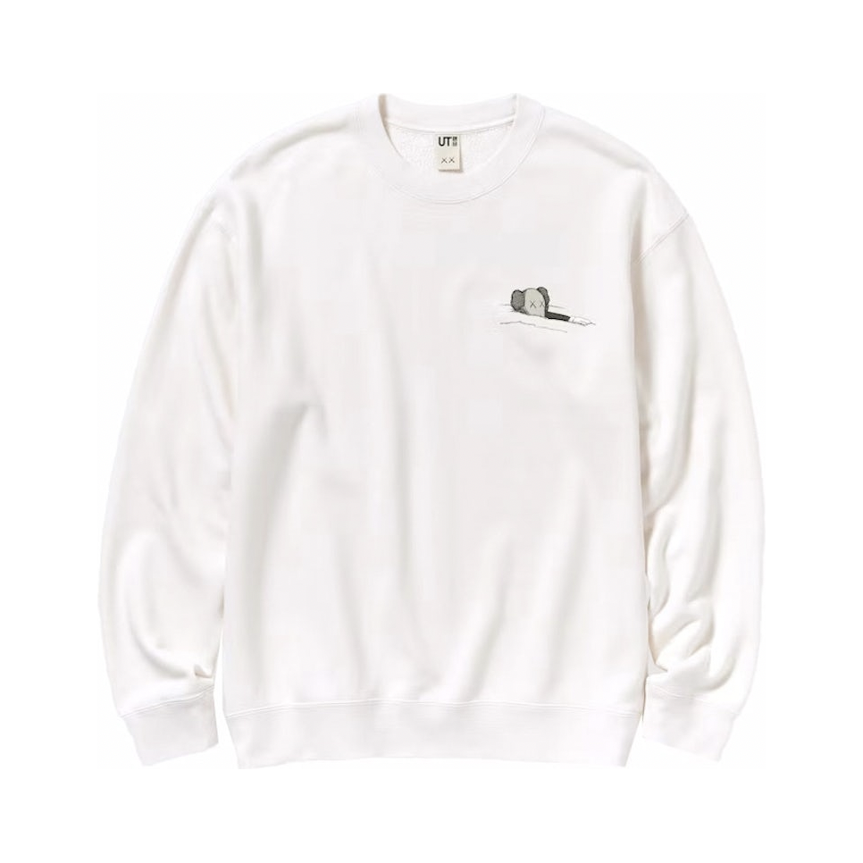KAWS UT GRAPHIC SWEATSHIRT WHITE by Kaws in Clothing. Available at KershKicks for £75.00. A must-have for fans of Kaws looking to elevate their style with this Crewneck.
