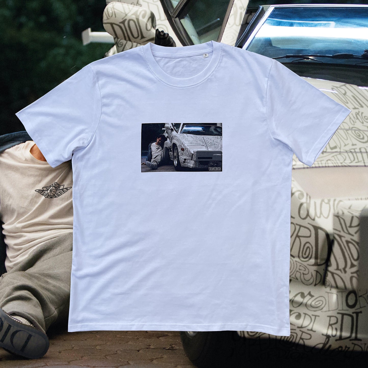 Quaaludes Tee White by KershKicks in . Available at KershKicks for £35.00. A must-have for fans of KershKicks looking to elevate their style with this T-Shirt.