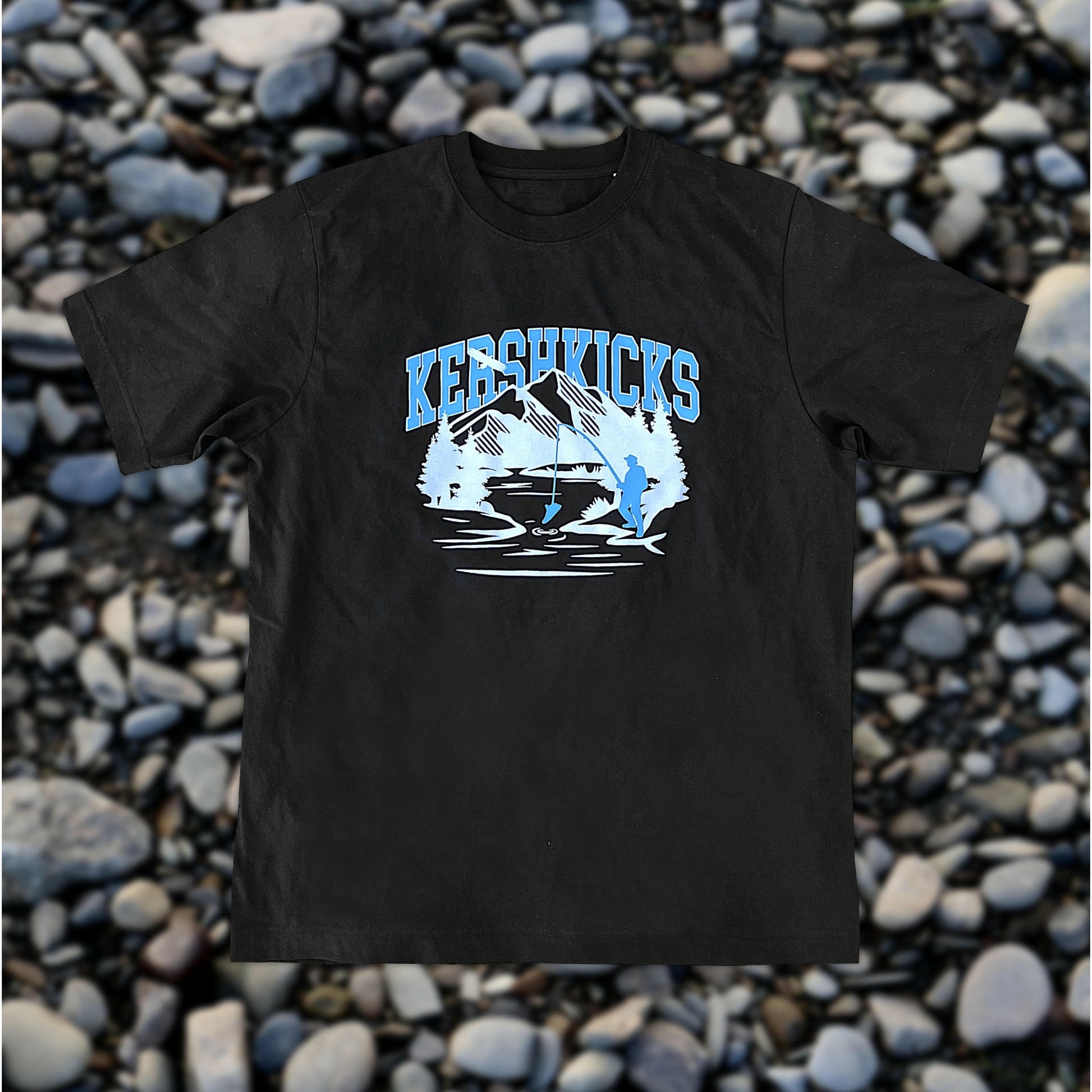 KERSHKICKS FISHING TEE by KershKicks in . Available at KershKicks for £30.00. A must-have for fans of KershKicks looking to elevate their style with this T-Shirt.