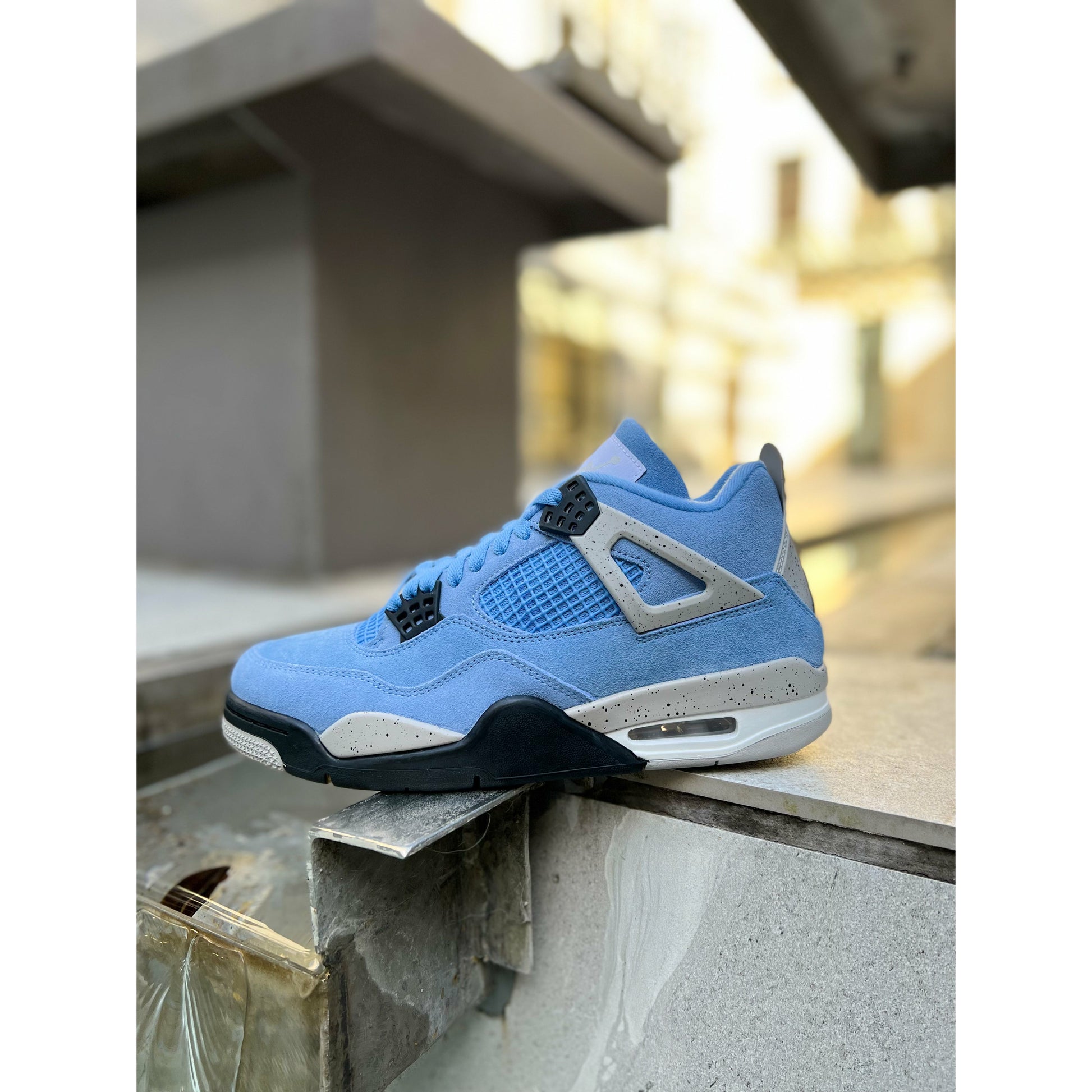 Jordan 4 Retro University Blue by Jordan's in Shoes. Available at KershKicks for £600.00. A must-have for fans of Jordan's looking to elevate their style with this Shoes.