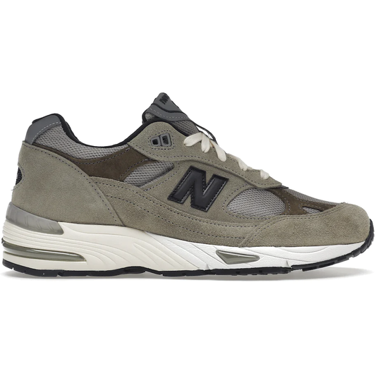 New Balance 991 MiUK JJJJound Grey Olive by New Balance in Shoes. Available at KershKicks for £345.00. A must-have for fans of New Balance looking to elevate their style with this Shoes.