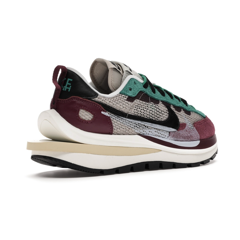 Nike Vaporwaffle sacai Villain Red Neptune Green by Nike in Shoes. Available at KershKicks for £600.00. A must-have for fans of Nike looking to elevate their style with this Shoes.