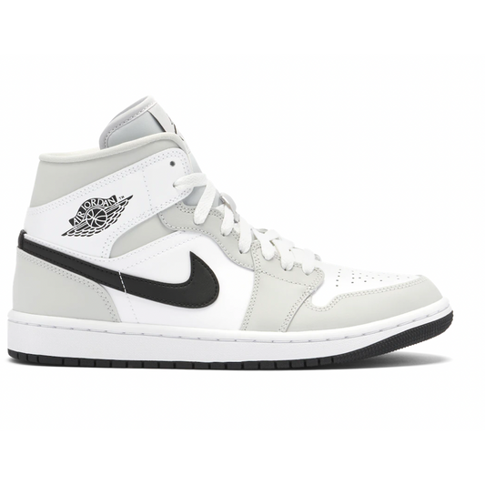 Jordan 1 Mid Light Smoke Grey (W) by Jordan's in Shoes. Available at KershKicks for £175.00. A must-have for fans of Jordan's looking to elevate their style with this Shoes.