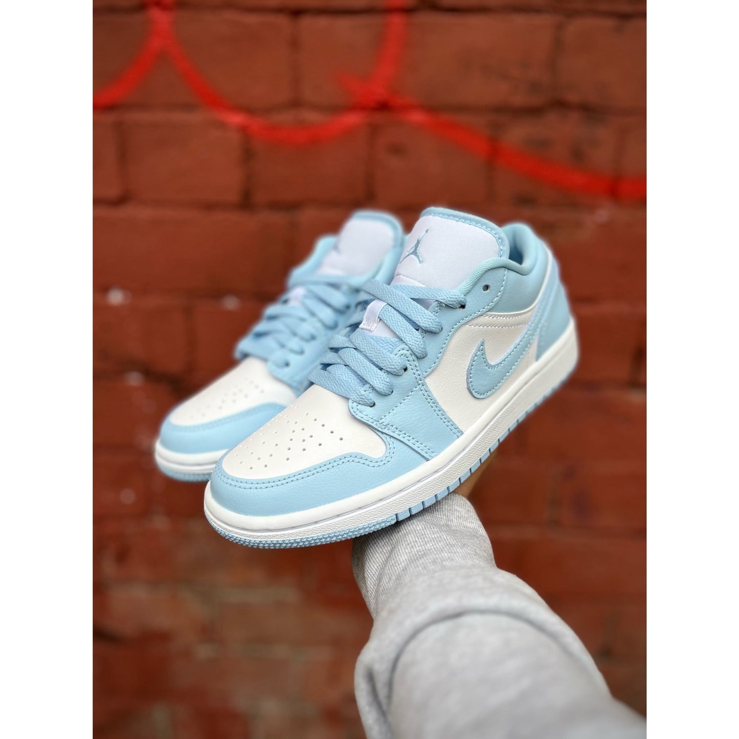 Jordan 1 Low Aluminum (W) by Jordan's in Shoes. Available at KershKicks for £145.00. A must-have for fans of Jordan's looking to elevate their style with this Shoes.