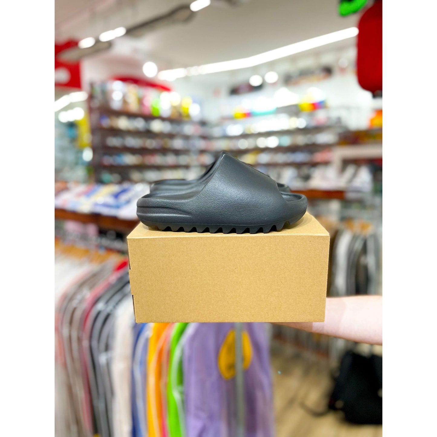 adidas Yeezy Slide Onyx by Yeezy in Shoes. Available at KershKicks for £121.50. A must-have for fans of Yeezy looking to elevate their style with this Shoes.