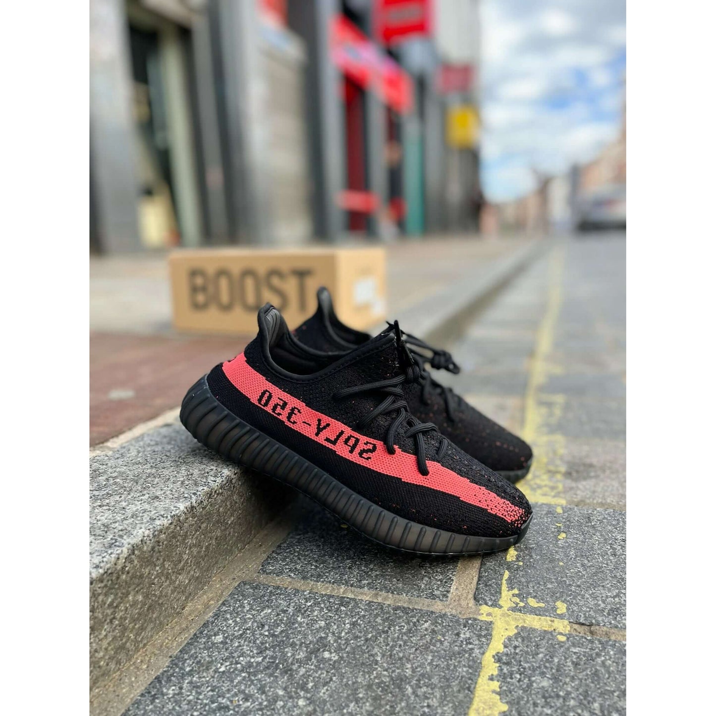adidas Yeezy Boost 350 V2 Core Black Red (2022) by Yeezy in Shoes. Available at KershKicks for £230.00. A must-have for fans of Yeezy looking to elevate their style with this Shoes.