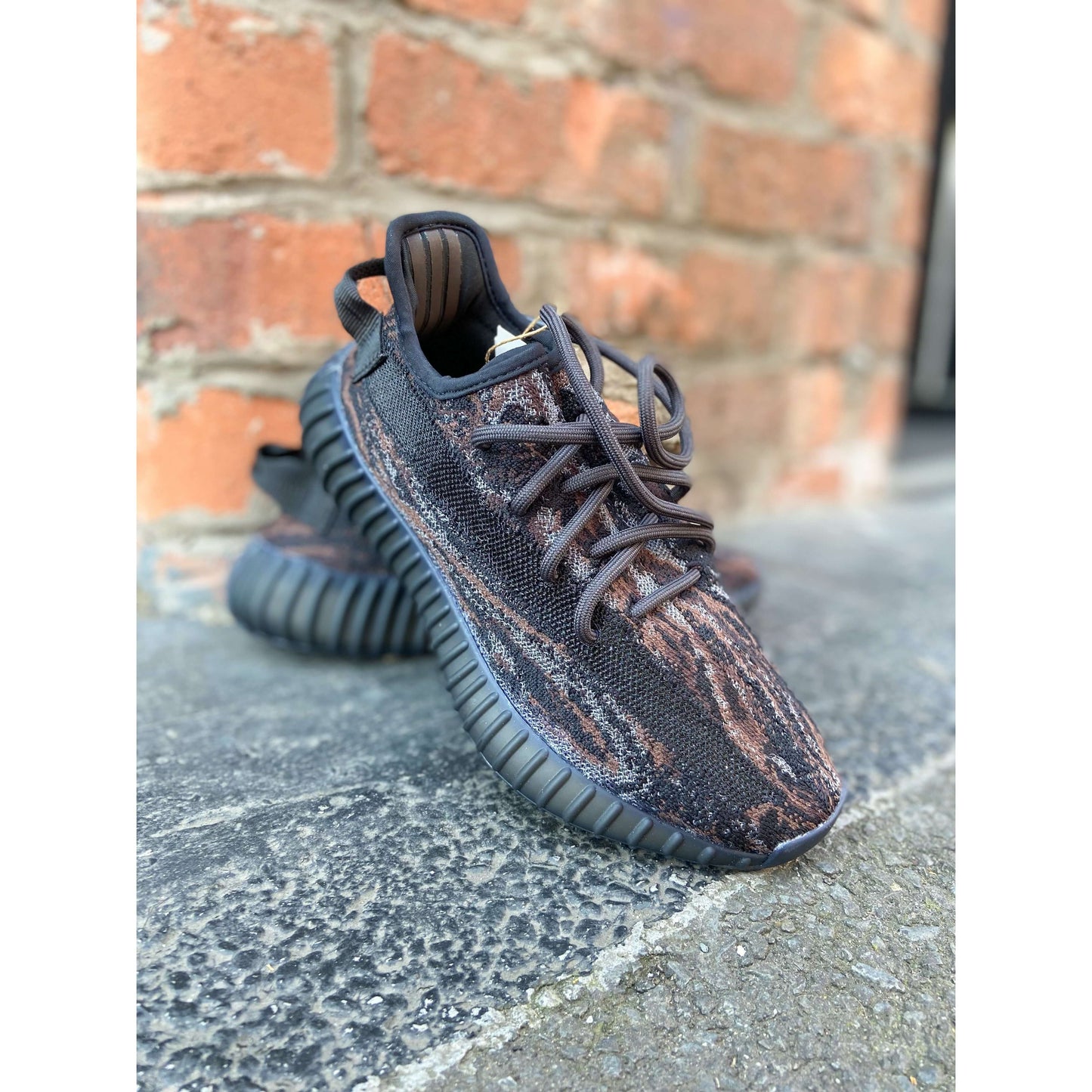 Adidas Yeezy Boost 350 V2 MX Rock by Yeezy in Shoes. Available at KershKicks for £195.00. A must-have for fans of Yeezy looking to elevate their style with this Shoes.