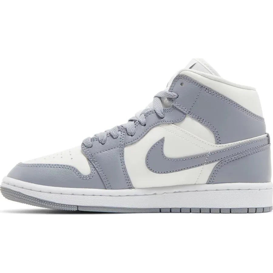 Jordan 1 Mid Stealth (W) by Jordan's in Shoes. Available at KershKicks for £135.00. A must-have for fans of Jordan's looking to elevate their style with this Shoes.