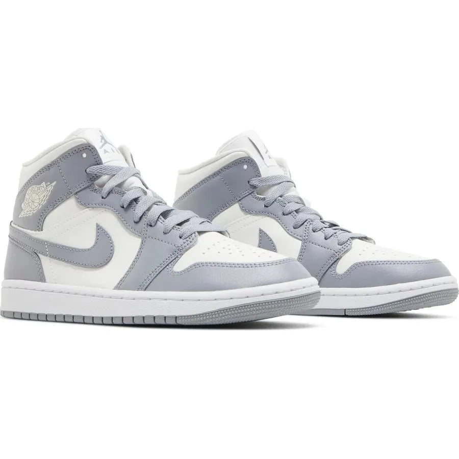 Jordan 1 Mid Stealth (W) by Jordan's in Shoes. Available at KershKicks for £135.00. A must-have for fans of Jordan's looking to elevate their style with this Shoes.