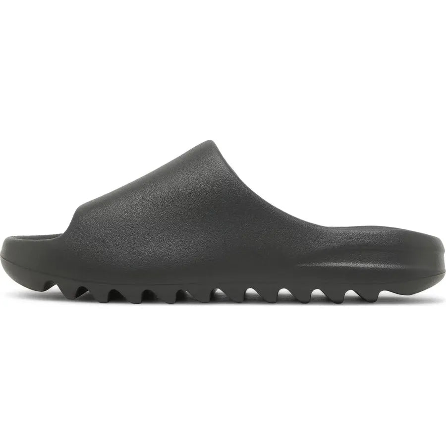 adidas Yeezy Slide Dark Onyx by Yeezy in Shoes. Available at KershKicks for £110.00. A must-have for fans of Yeezy looking to elevate their style with this Shoes.