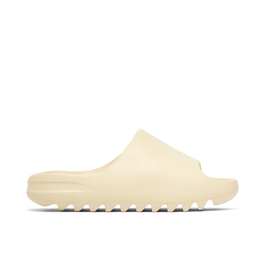 Adidas Yeezy Slide Bone 2022 by Yeezy in Shoes. Available at KershKicks for £155.00. A must-have for fans of Yeezy looking to elevate their style with this Shoes.
