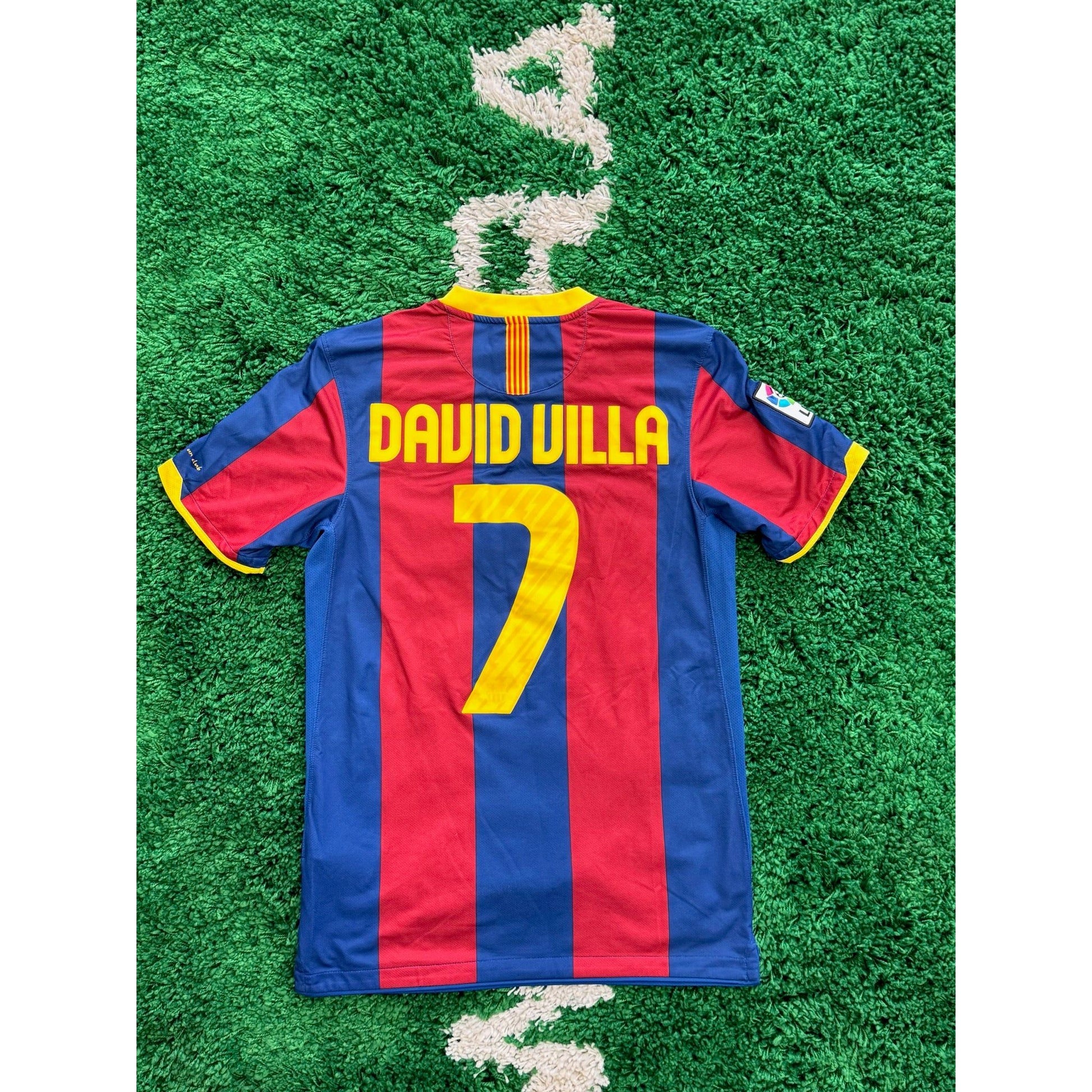 Barcelona Home Shirt 2010-2011 Villa #7 S by KershKits in Clothing. Available at KershKicks for £100.00. A must-have for fans of KershKits looking to elevate their style with this Kits.