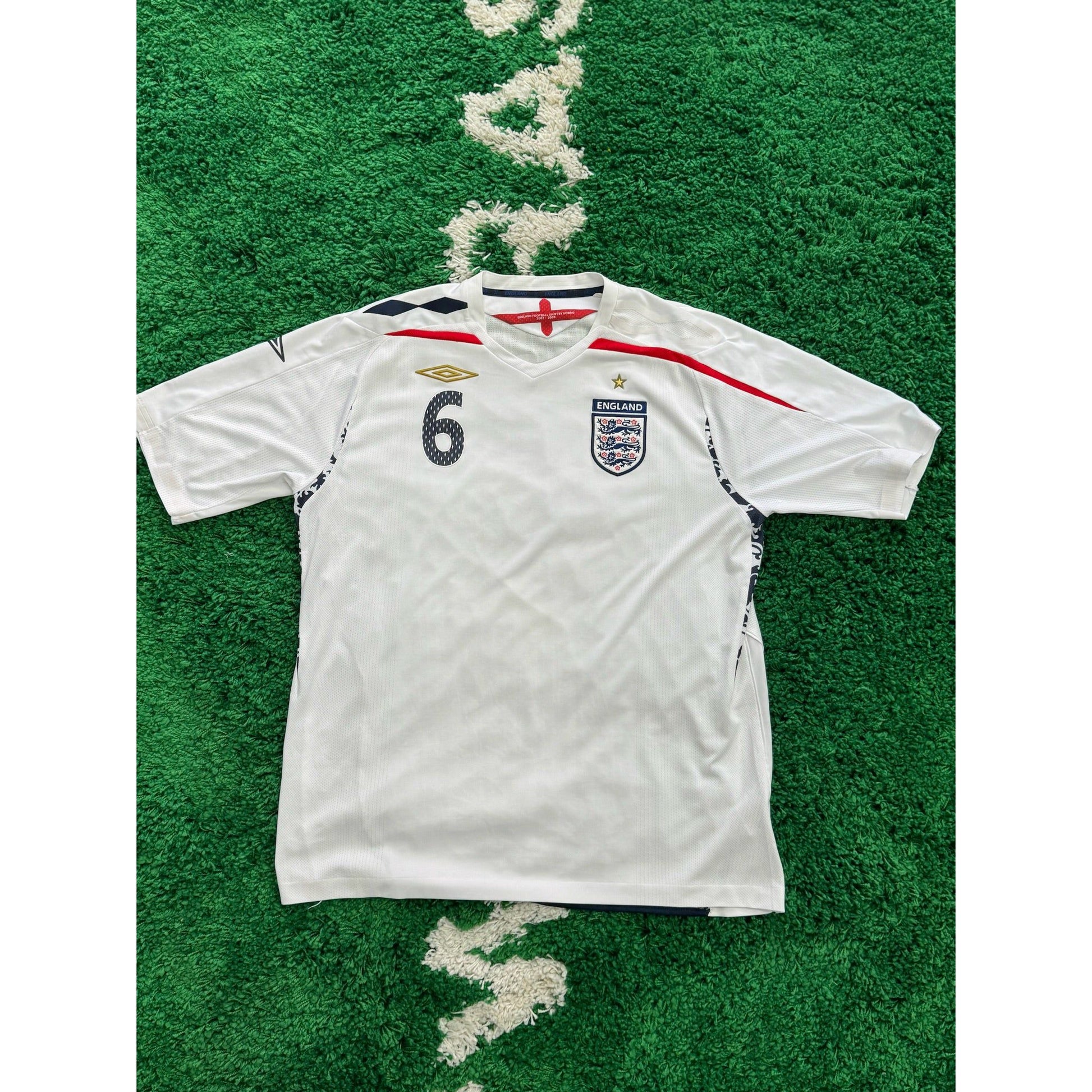 England Home Shirt 2008-2010 Terry #6 XL by KershKits in Clothing. Available at KershKicks for £75.00. A must-have for fans of KershKits looking to elevate their style with this Kits.