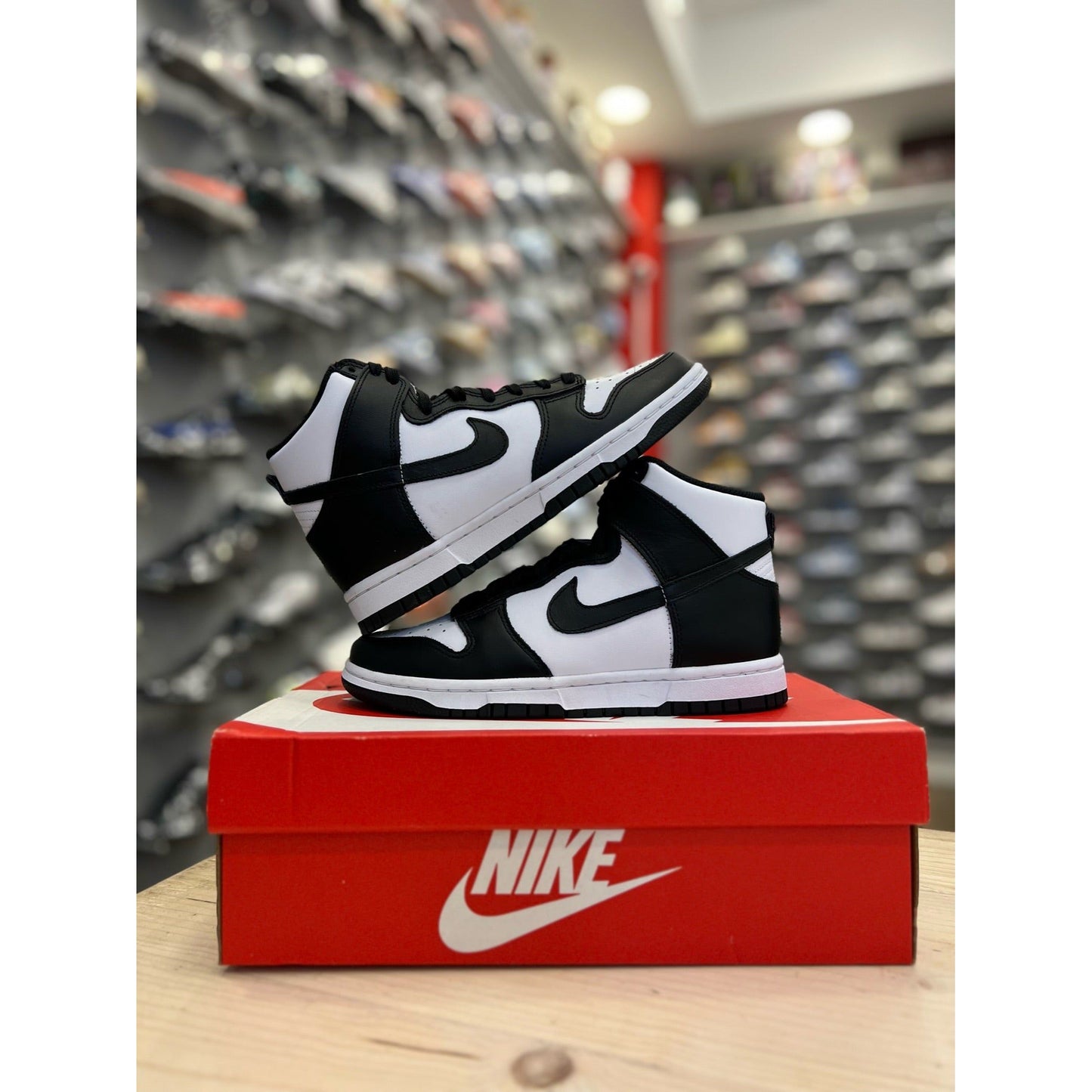 Nike Dunk High Panda (2021 Red Logo) by Nike in Shoes. Available at KershKicks for £135.00. A must-have for fans of Nike looking to elevate their style with this Shoes.