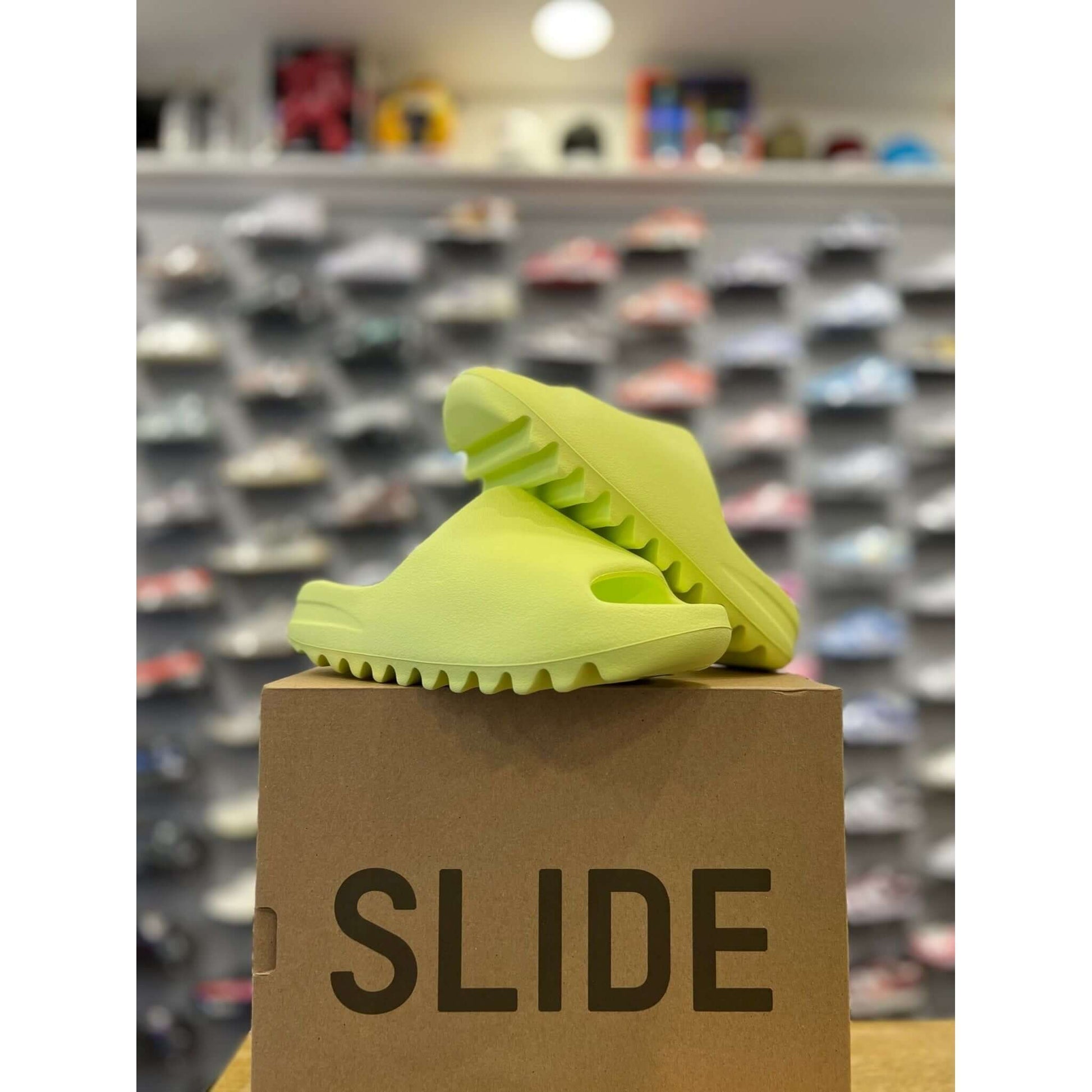 adidas Yeezy Slide Glow Green by Yeezy in Shoes. Available at KershKicks for £150.00. A must-have for fans of Yeezy looking to elevate their style with this Shoes.