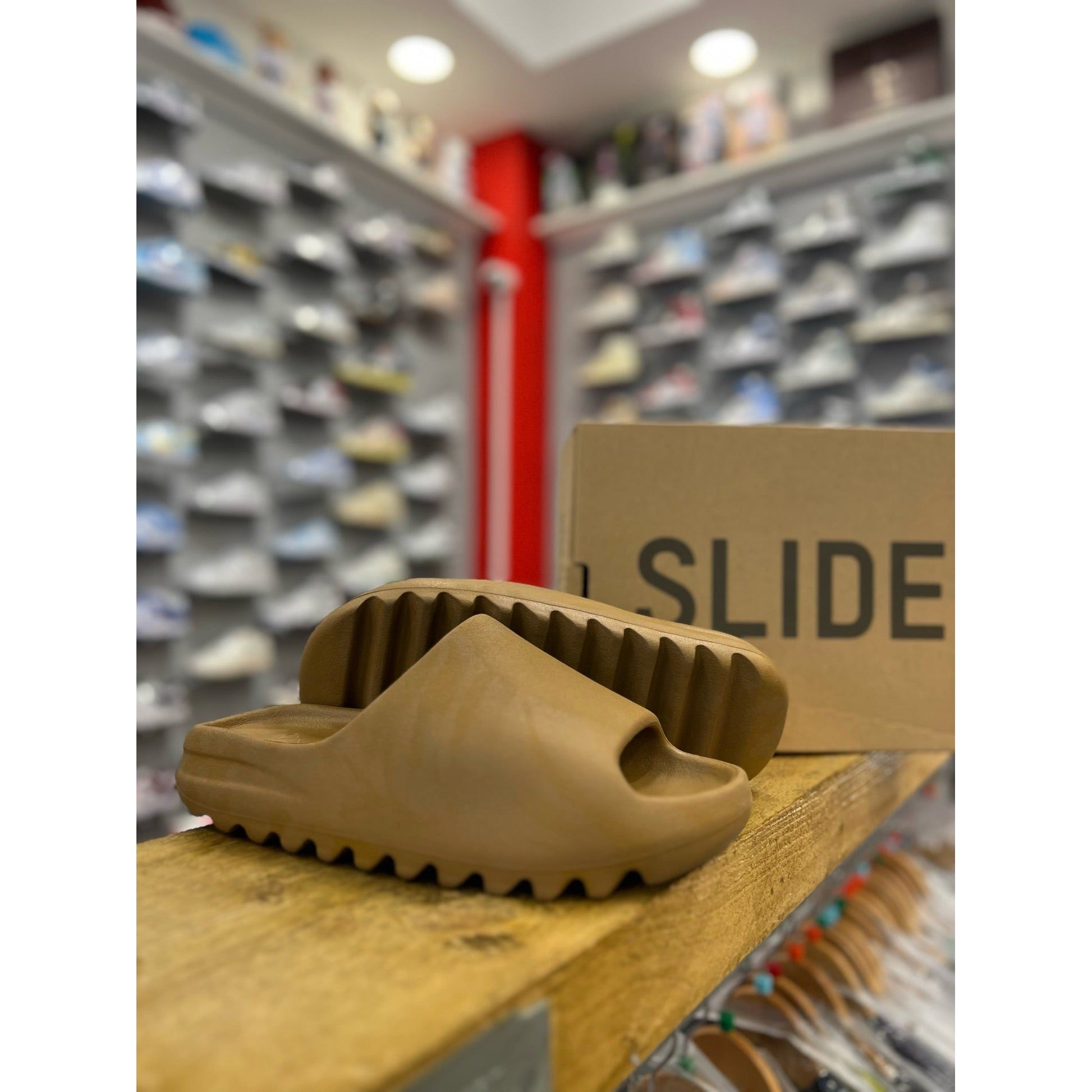 Yeezy Slide Core by Yeezy in Shoes. Available at KershKicks for £175.00. A must-have for fans of Yeezy looking to elevate their style with this Shoes.