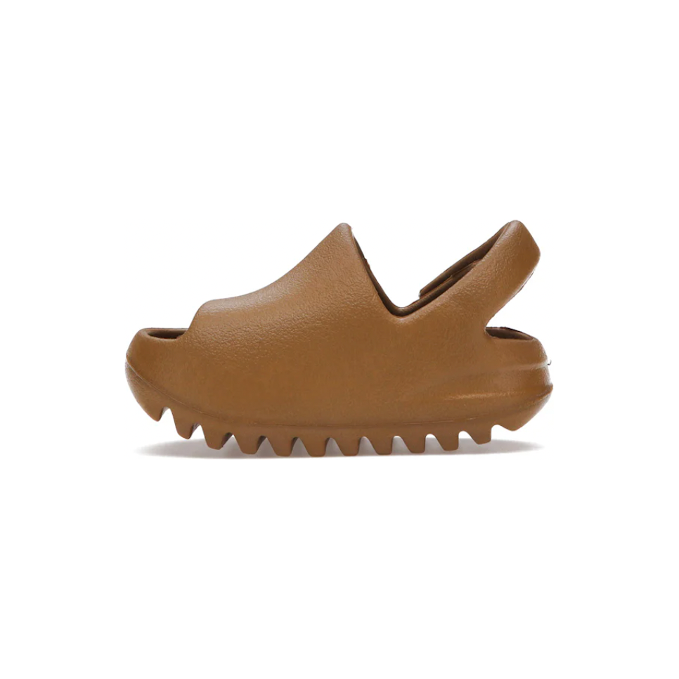 Yeezy Slide Ochre (Infants) by Adidas in Shoes. Available at KershKicks for £70.00. A must-have for fans of Adidas looking to elevate their style with this Kids Trainers.
