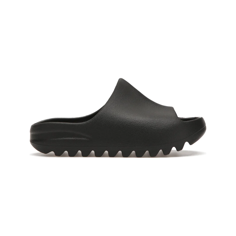 Yeezy Slide Onyx (Kids) by Adidas in Shoes. Available at KershKicks for £70.00. A must-have for fans of Adidas looking to elevate their style with this Kids Trainers.