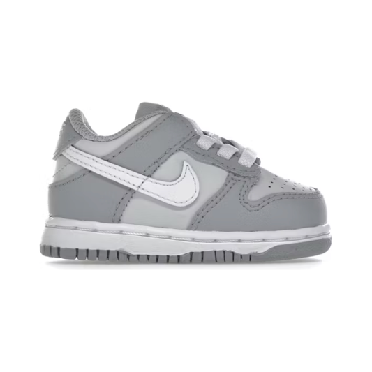 Nike Dunk Low Two-Toned Grey (TD) by Nike in Shoes. Available at KershKicks for £60.00. A must-have for fans of Nike looking to elevate their style with this Kids Trainers.