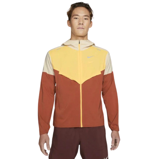 Nike Repel Windrunner Jacket 'Yellow/Orange' by Nike in Activewear. Available at KershKicks for £71.00. A must-have for fans of Nike looking to elevate their style with this Activewear.