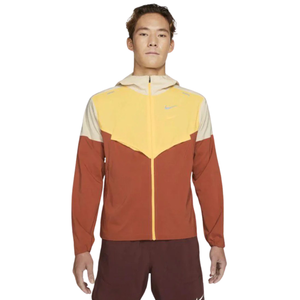 Nike Repel Windrunner Jacket 'Yellow/Orange' by Nike in Activewear. Available at KershKicks for £71.00. A must-have for fans of Nike looking to elevate their style with this Activewear.