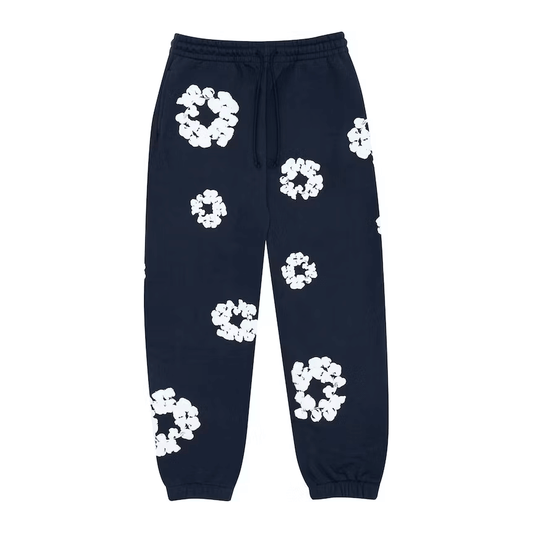 Denim Tears Cotton Wreath Sweatpants Navy by Denim Tears in Sweatpants. Available at KershKicks for £375.00. A must-have for fans of Denim Tears looking to elevate their style with this Sweatpants.