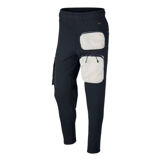 Travis Scott x Nike NRG AG Utility Sweatpants Black by Travis Scott in Sweatpants. Available at KershKicks for £250.00. A must-have for fans of Travis Scott looking to elevate their style with this Sweatpants.