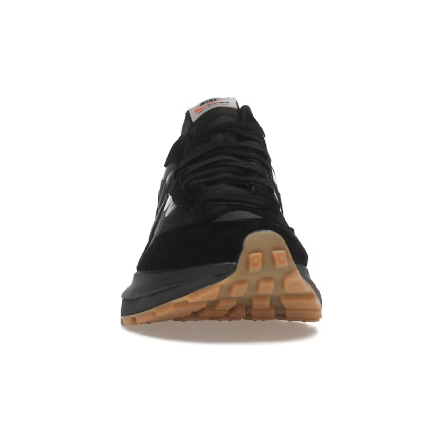 Nike Vaporwaffle Sacai Black Gum by Nike in Shoes. Available at KershKicks for £450.00. A must-have for fans of Nike looking to elevate their style with this Shoes.