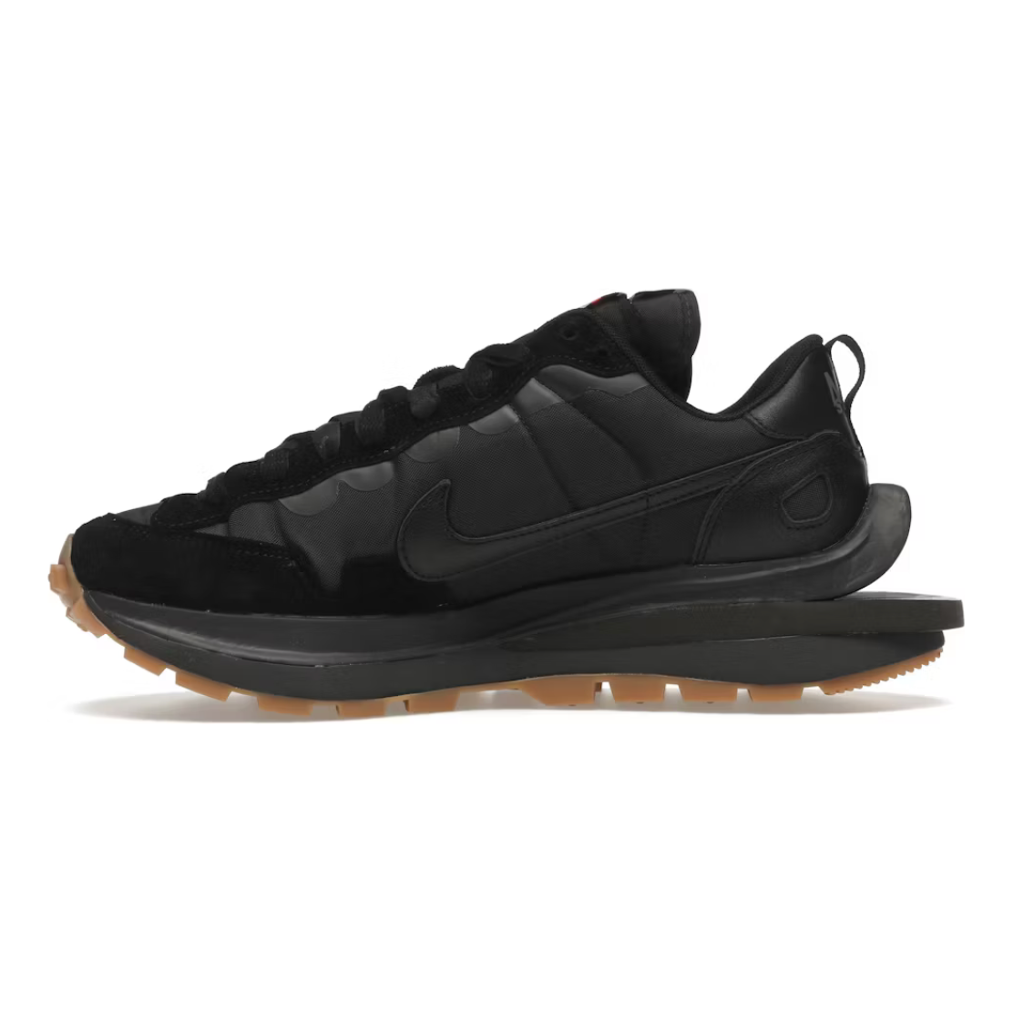 Nike Vaporwaffle Sacai Black Gum by Nike in Shoes. Available at KershKicks for £450.00. A must-have for fans of Nike looking to elevate their style with this Shoes.