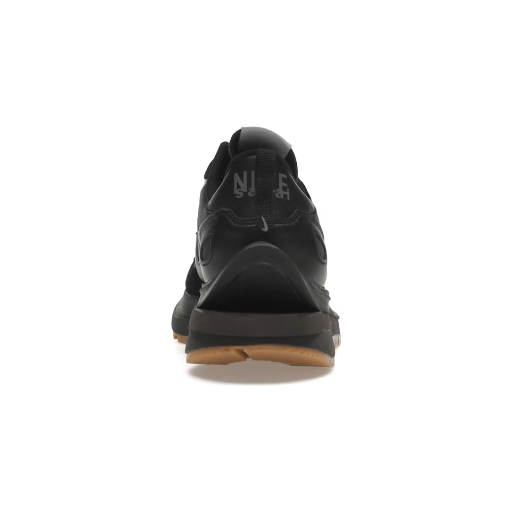 Nike Vaporwaffle Sacai Black Gum by Nike in Shoes. Available at KershKicks for £450.00. A must-have for fans of Nike looking to elevate their style with this Shoes.